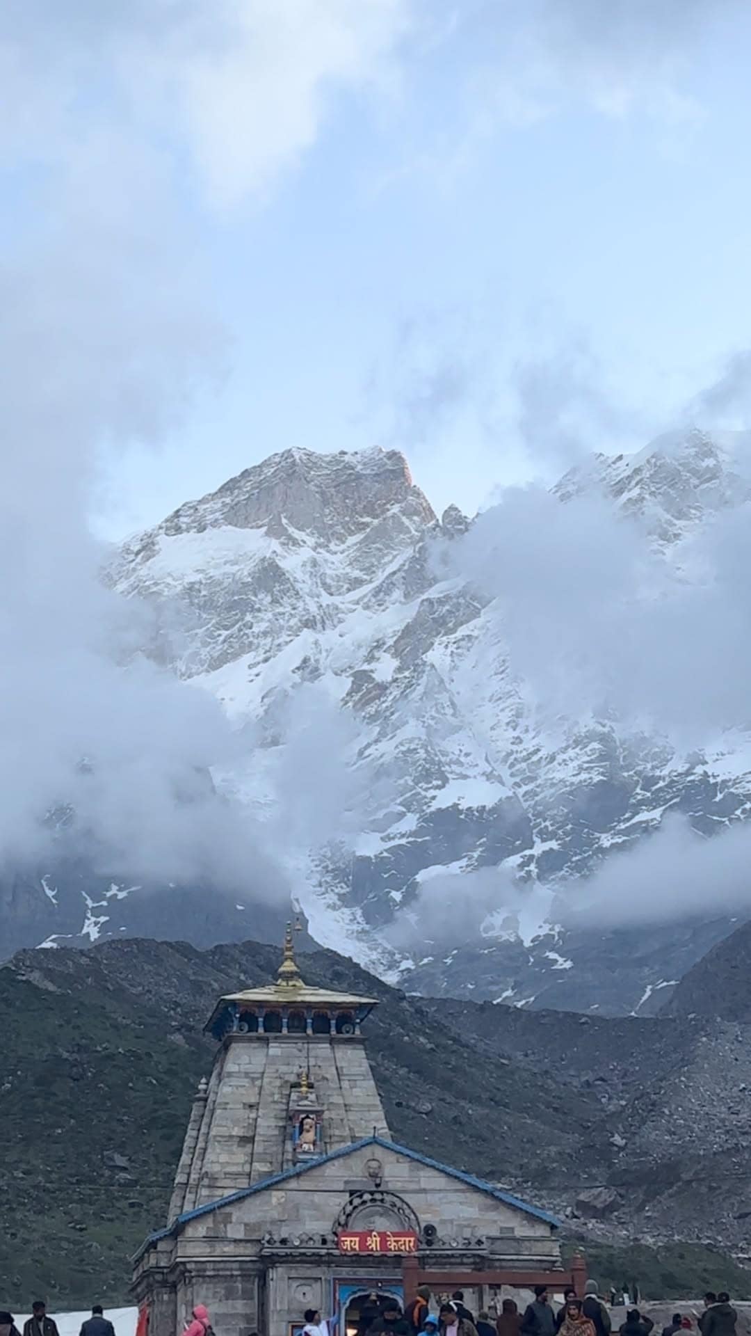 The Kedarnath valley and temple ringed by snow peaks